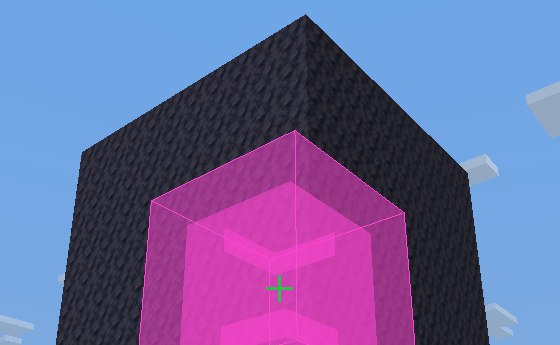 A geode's amethyst highlighted bright pink inside dark rock